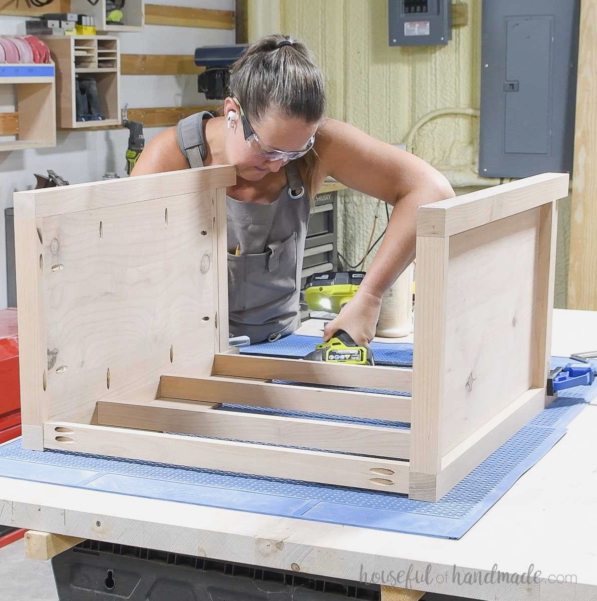 Fastening the front pieces to the second assembled side. 