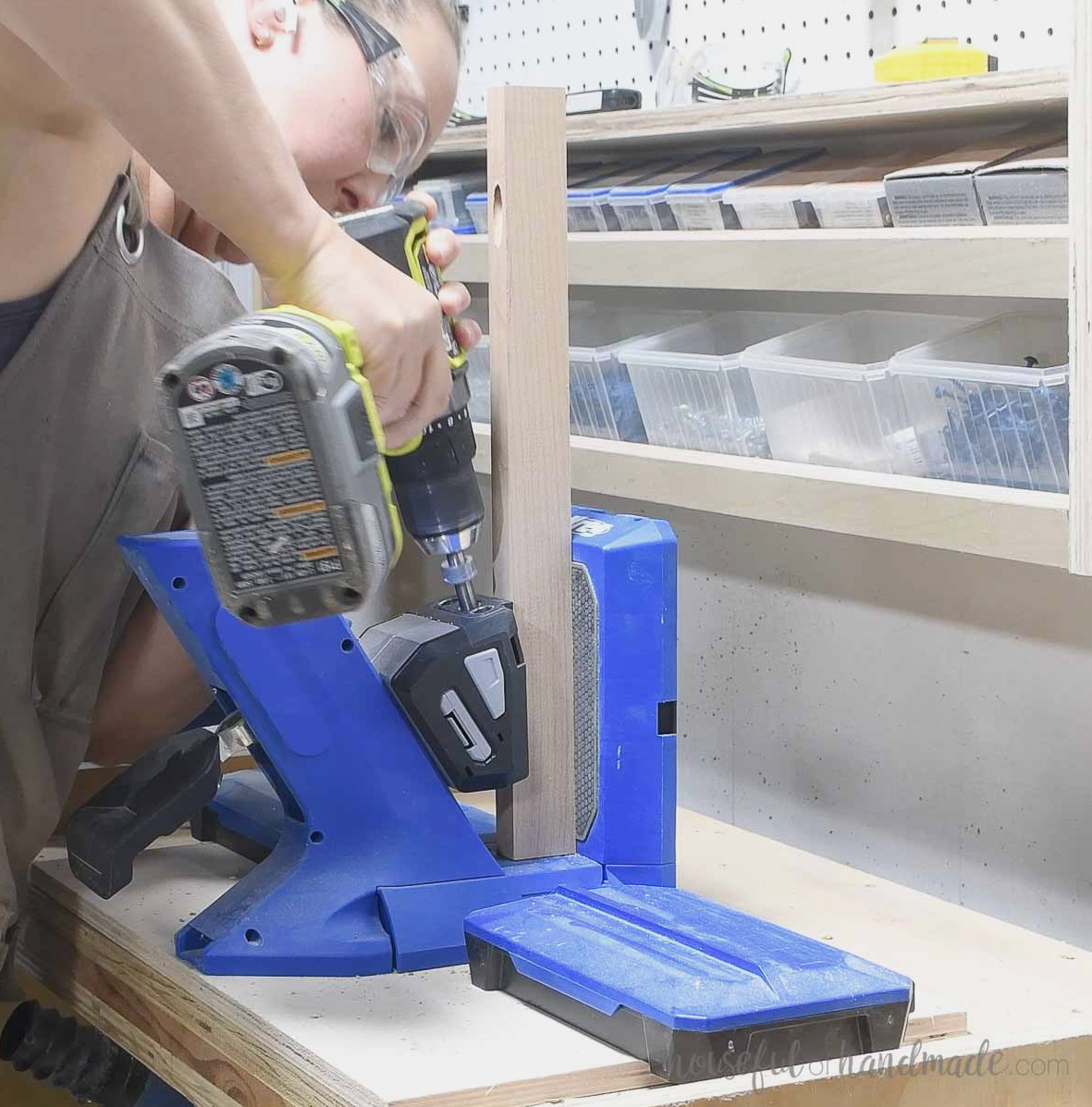 Drilling a pocket hole on the short side of the 1x2 board.