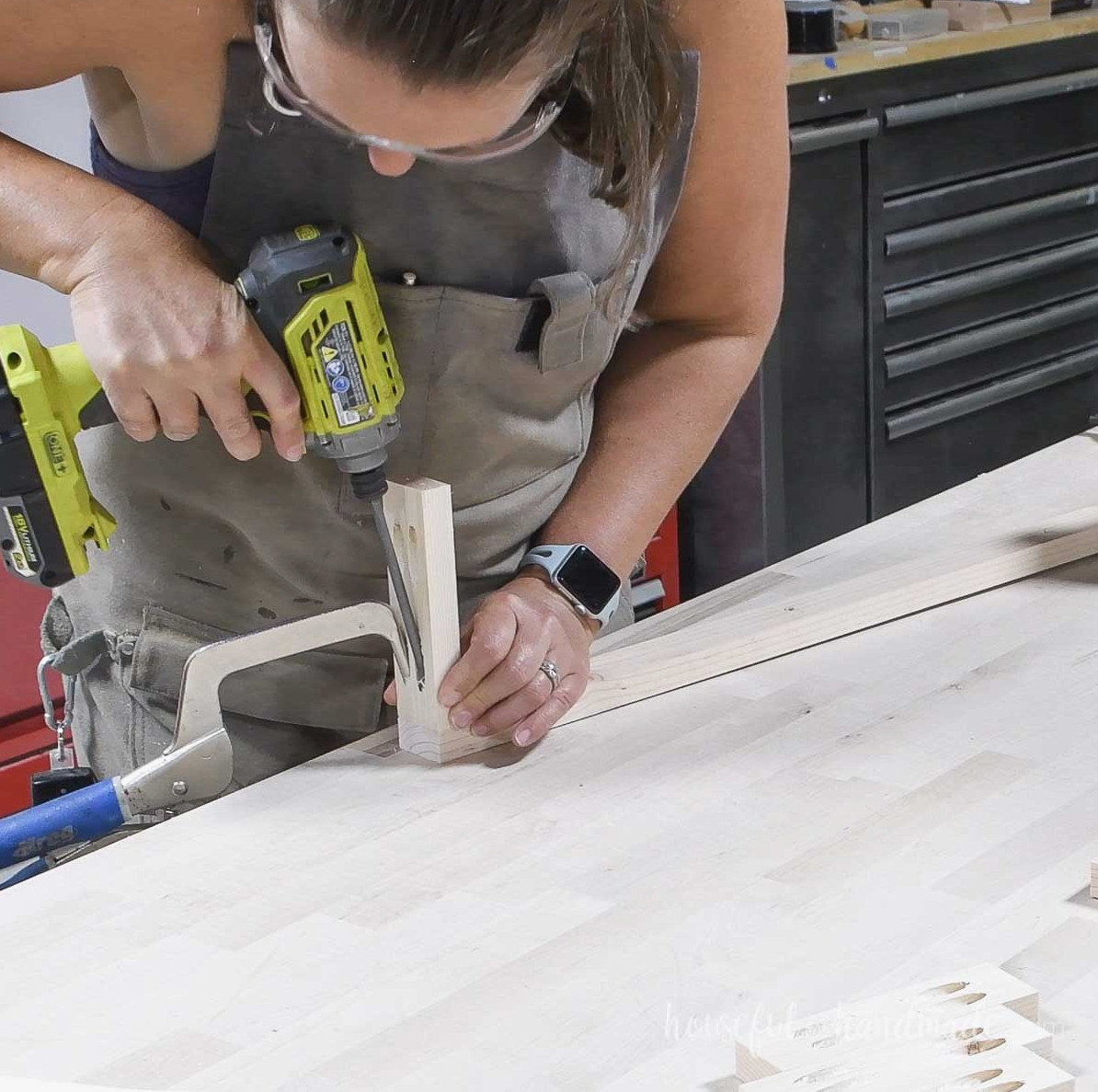 Fastening a top/bottom component to the side board with pocket hole screws.