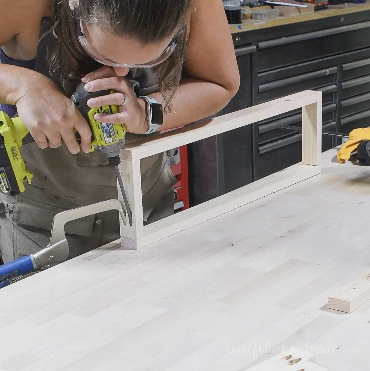 Securing the second side piece to form a rectangle.