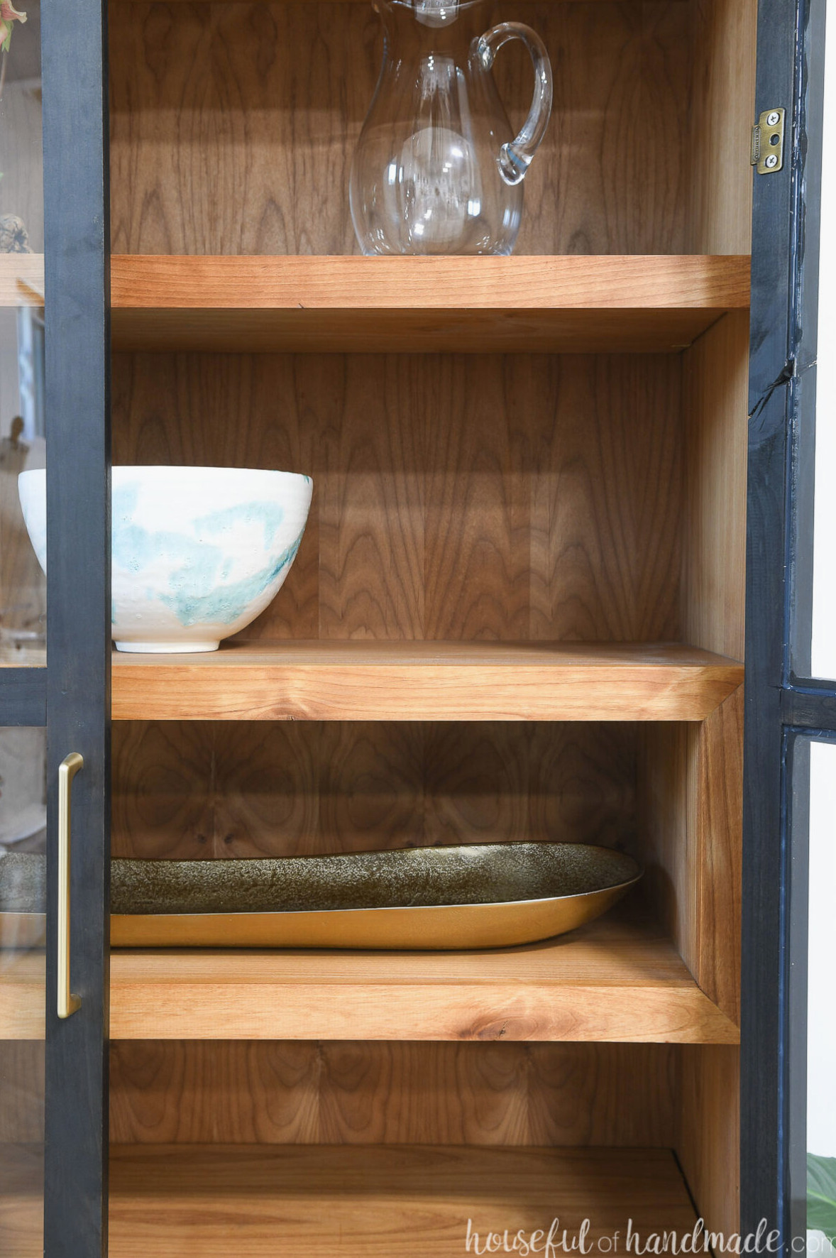 Close-up of the built-in display cubby inside the display cabinet.