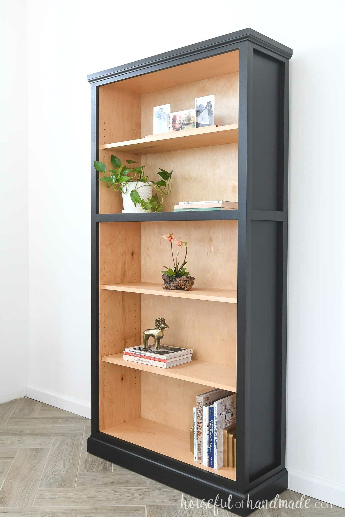 Side view of the tall bookcase with trim covering the screws. 