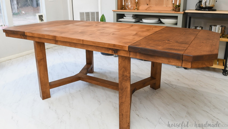 DIY trestle dining table measuring 90" with both breadboard leaves attached.