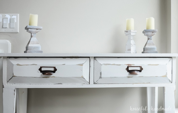Create a lovely small console table for added storage and home decor. This DIY farmhouse console table features two spacious drawers and two shelves. An ideal storage solution for compact spaces. Housefulofhandmade.com The upper two drawers during construction of the small console table. Ample storage space inside. Housefulofhandmade.com