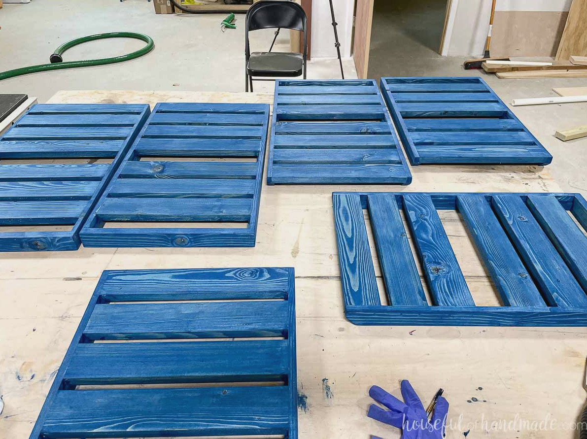 All 6 plant shelves for the tiered corner stand finished in a rich blue stain. 