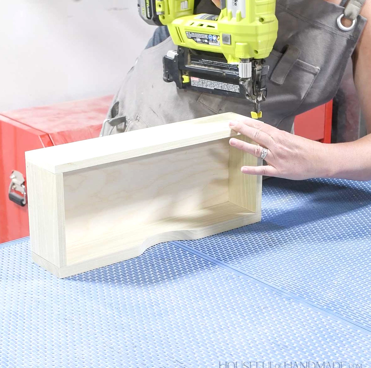 Nailing the front and back on the drawer. 