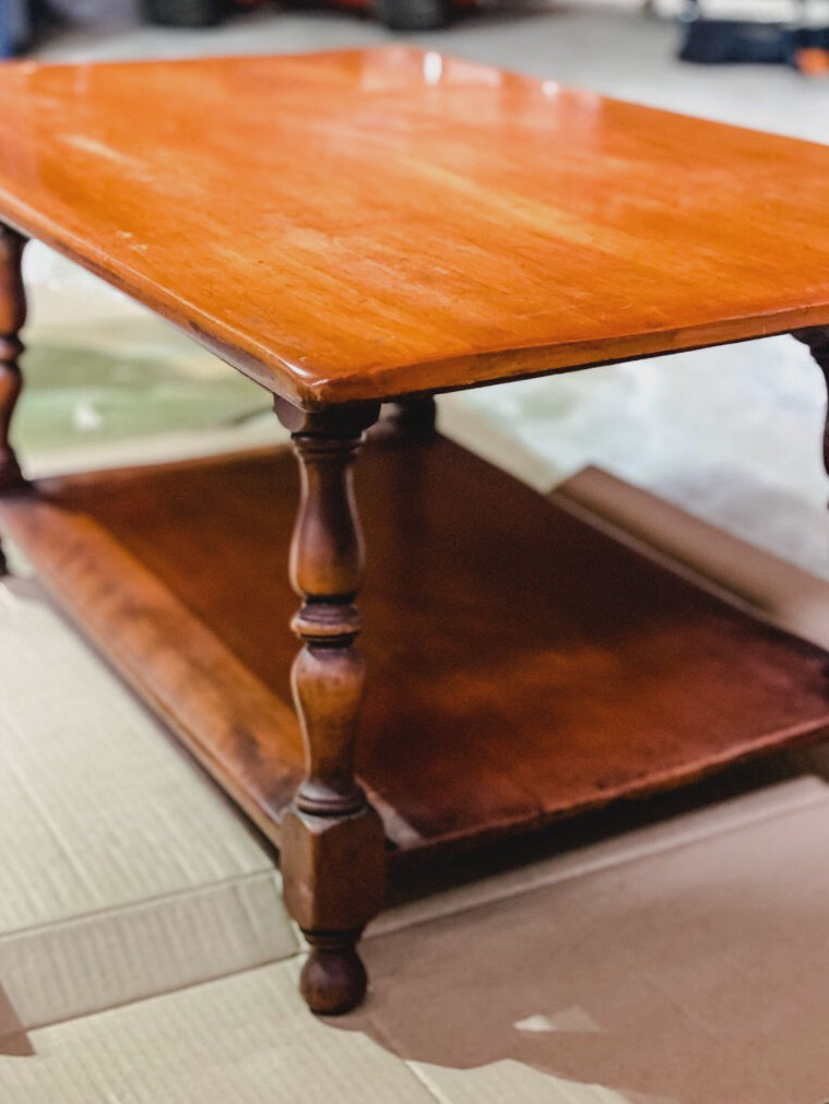 side view of old wood coffee table