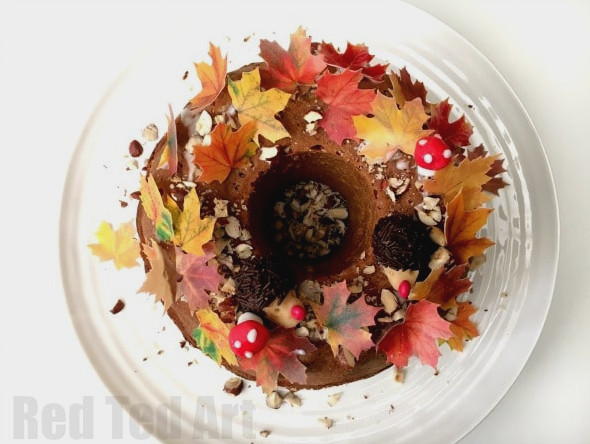 Thanksgiving Cake Decorating Ideas - How cute is this Fall Cake? Completely edible and oh so cute! We made this as my Mother in Law's Birthday Cake. The kids helped make the cake, hedgehogs and mushrooms.. the assembly of this Birthday/ Thanksgiving cake is super easy too!