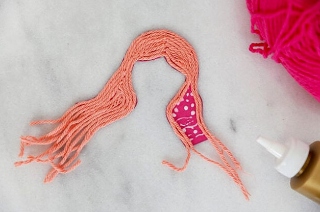 Yarn onto glued hair