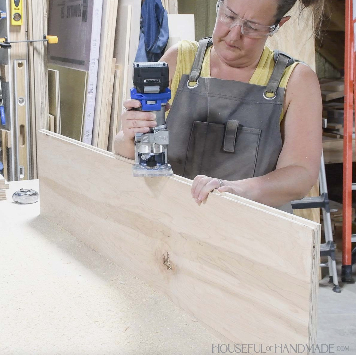 Routing a groove in the back edge of the side board.