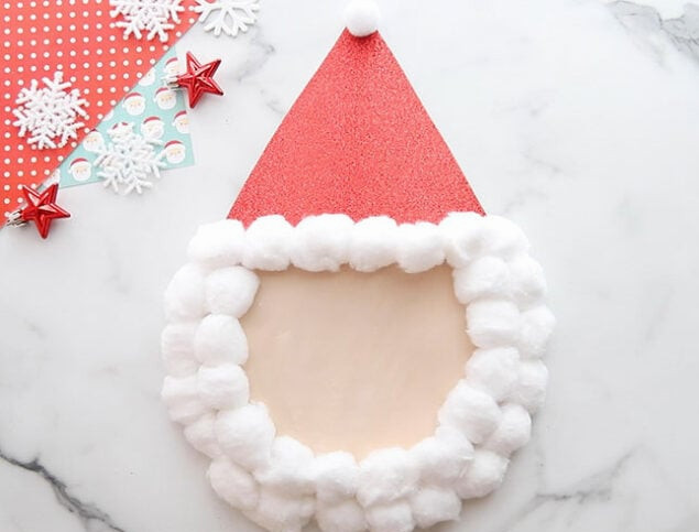 Glue cotton balls around paper plate