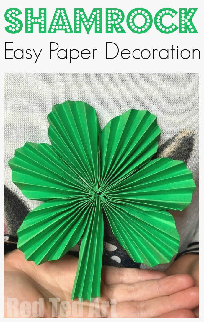 Paper Fan Shamrock Decorations - Have a Happy St Patrick's Day! A wonderful simple Paper St Patrick's Day decoration to create with children. Transform paper into beautiful Paper Fan Shamrocks. Use them to make Paper Shamrock Garlands or display them separately! They are fun to make too! #Shamrocks #papercrafts #papershamrock #stpatricksday