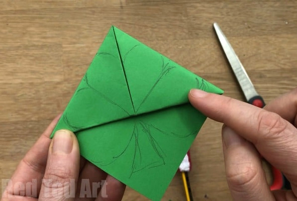 Simple Shamrock Corner Bookmark Design for St Patrick's Day. We adore a cheerful Corner Bookmark Design. These lucky Shamrock Bookmarks are fast and easy to create. A lovely little gift for someone on St Patrick;s Day!! Add the adorable Kawaii Shamrock faces or keep them plain! #Shamrock #Shamrockcraft #stpatricksday #cornerbookmark #bookmark