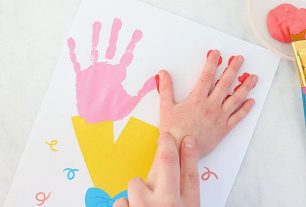 Pressing the second bouquet flower onto paper