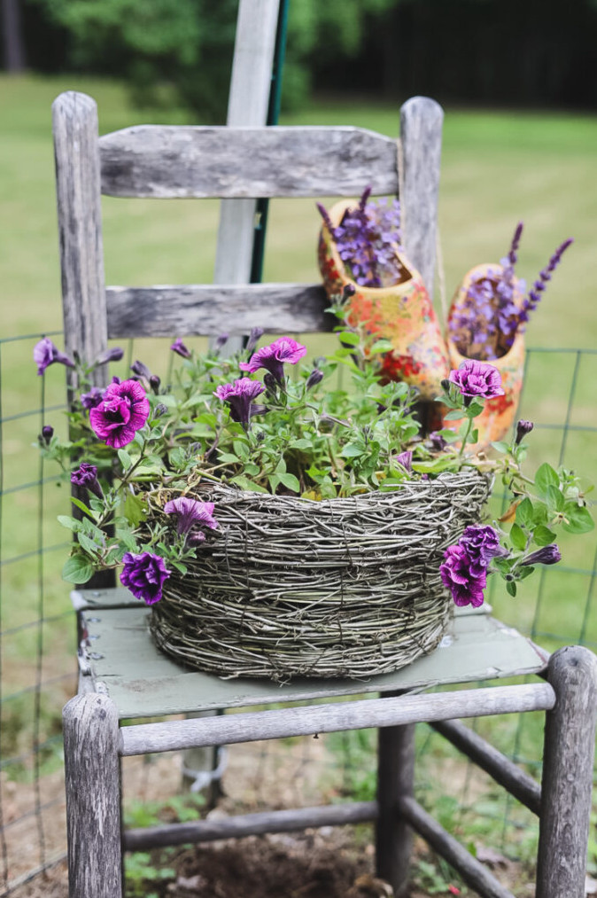 vintage chair with basket of flowers 