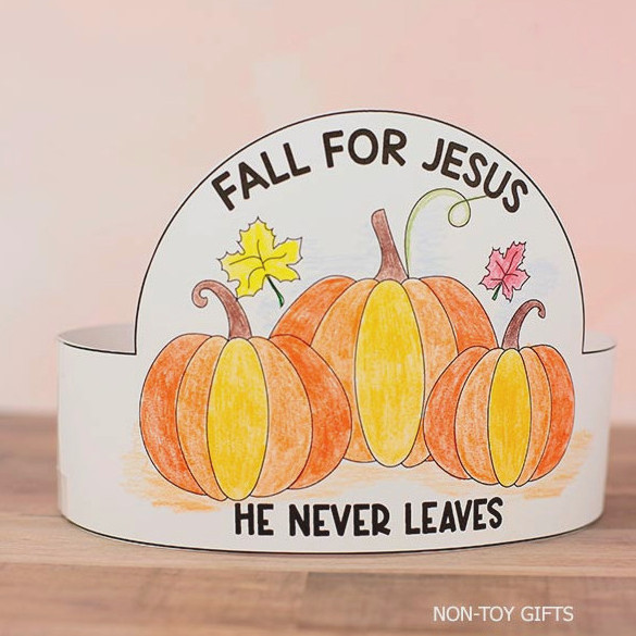 Children wearing a bright Christian autumn pumpkin headband craft with pumpkins and a faith-inspired seasonal message.