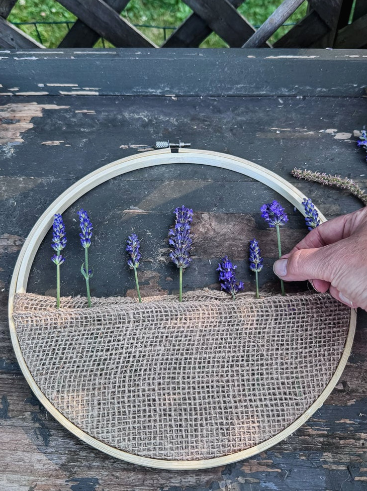 filling an embroidery hoop with flowers